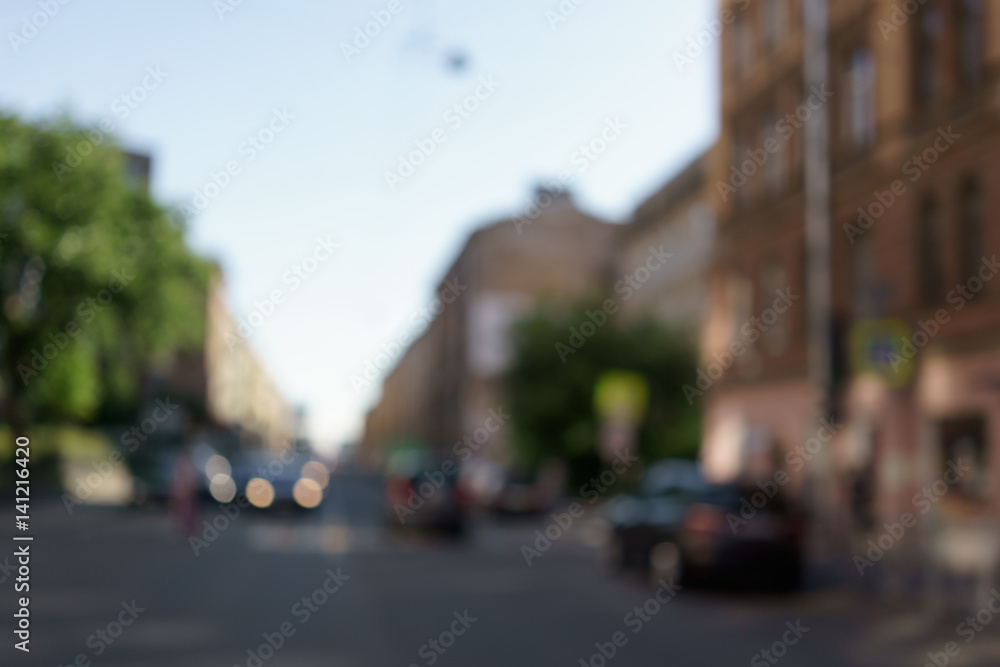 abstract city life blur with people and traffic, real lens bokeh