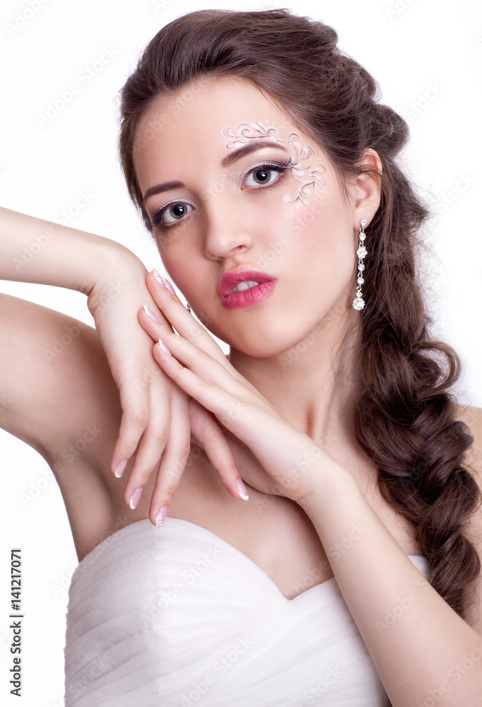 Portrait of beautiful young brunette woman bride  in white Wedding Dress
