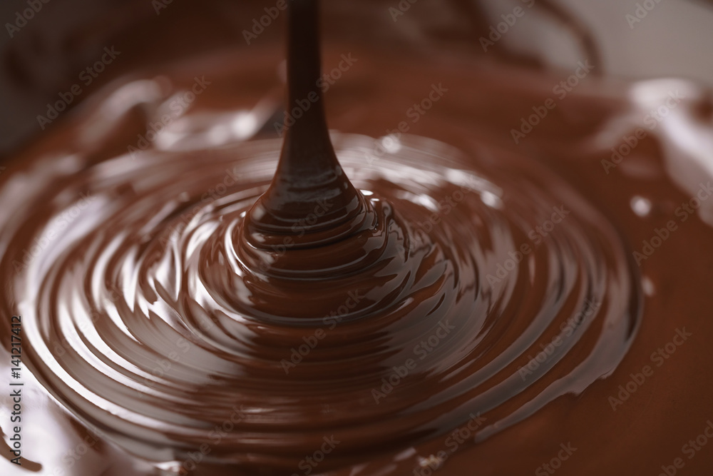 macro photo of premium dark chocolate pour in bowl, shallow focus macro photo of premium dark chocolate pour in bowl, shallow focus