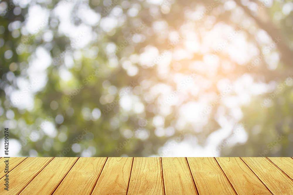 soft focus wooden table with blur nature abstract background soft focus wooden table with blur nature abstract background