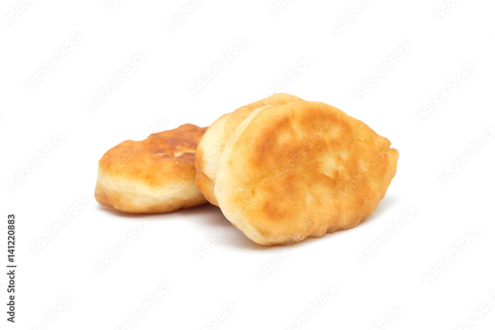 Fresh baked russian pastry pirozhki isolated on white Fresh baked russian pastry pirozhki isolated on white