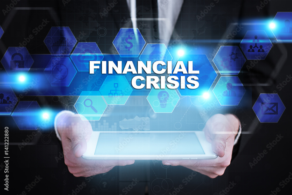 Businessman holding tablet PC with financial crisis concept. Businessman holding tablet PC with financial crisis concept.