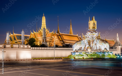 Grand palace and Wat Phra Kaew at twilight with deep blue sky in Bangkok, Thailand. Night view of famous and most visited temple of Thailand, outdoor travel photography photo