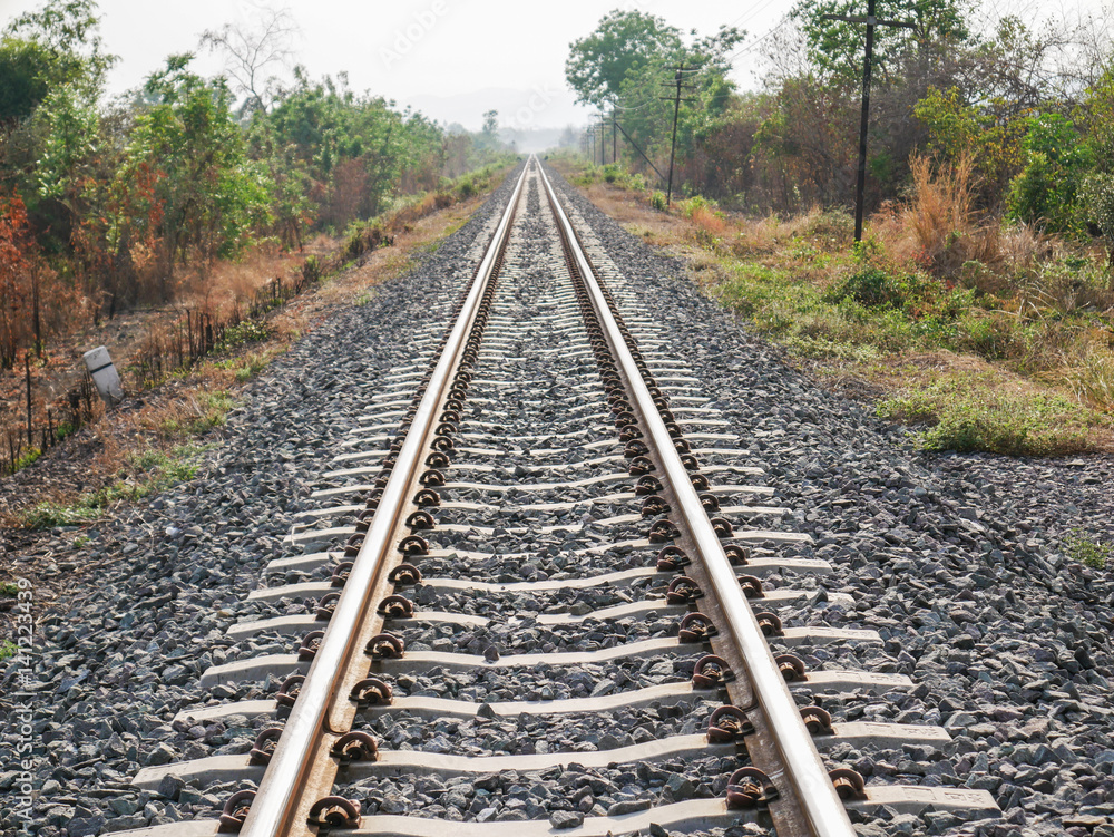 Railroad with vanishing point, parallel and infinity, railway background