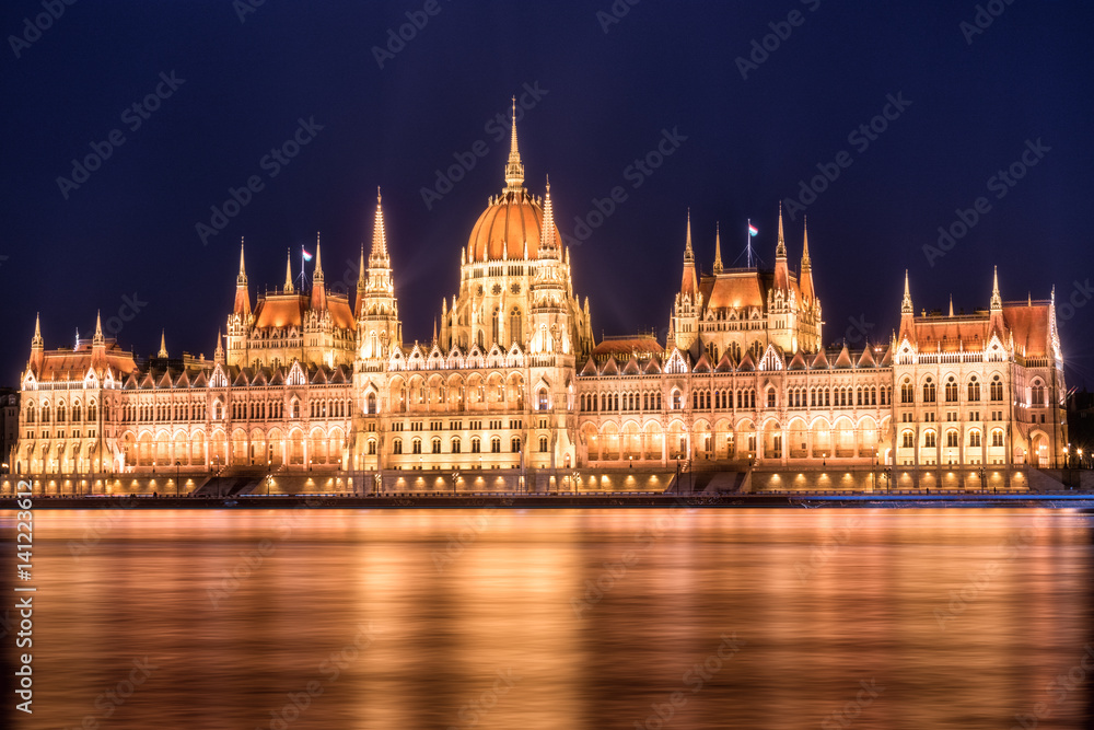 Parliament building in Budapest at night, illuminated by city lights, capital of Hungary, Eastern Europe Parliament building in Budapest at night, illuminated by city lights, capital of Hungary, Eastern Europe