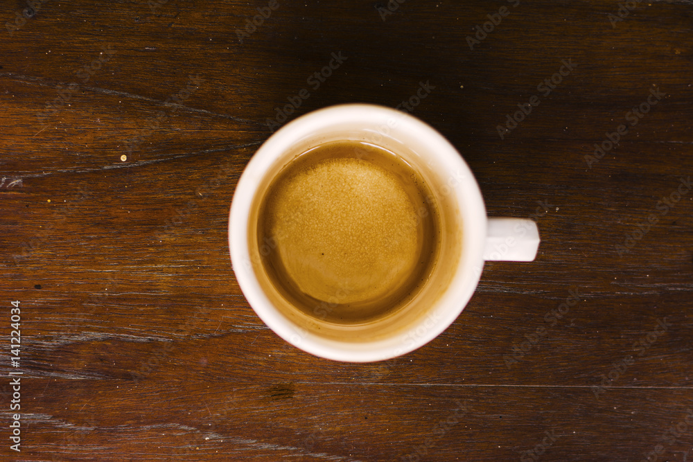 empty cup of coffee placed on wooden table empty cup of coffee placed on wooden table
