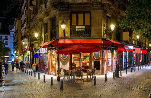 Night view of old cozy street in Madrid, Spain