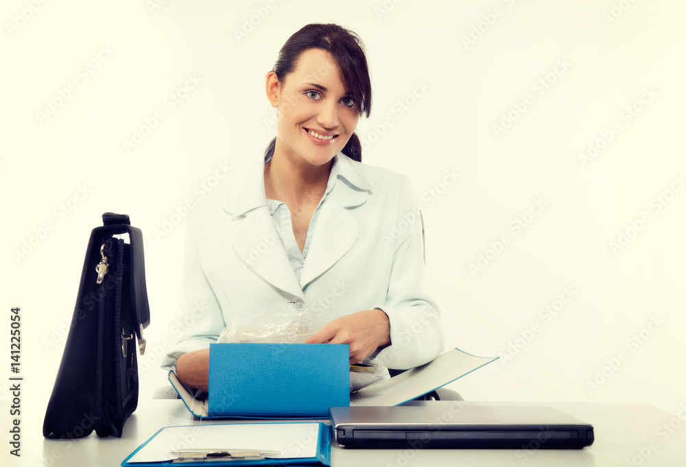 Young attractive business woman with briefcase at the office Young attractive business woman with briefcase at the office