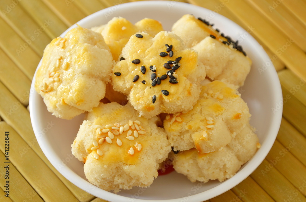 Chinese mini cookies dressing black and white sesame on cup