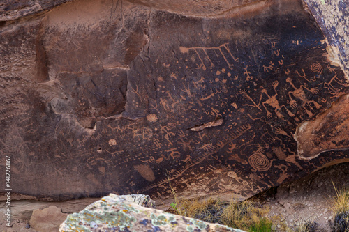 Petroglyphs of Newspaper Rock, a group of rockfaces with over 650 ancient carvings in Petrified Forest National Park, Arizona. The designs were created between 650 and 2,000 years ago.