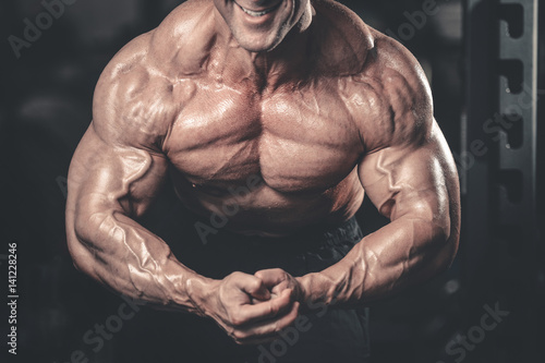 Принти на полотні Brutal caucasian handsome fitness men on diet training chest pumping