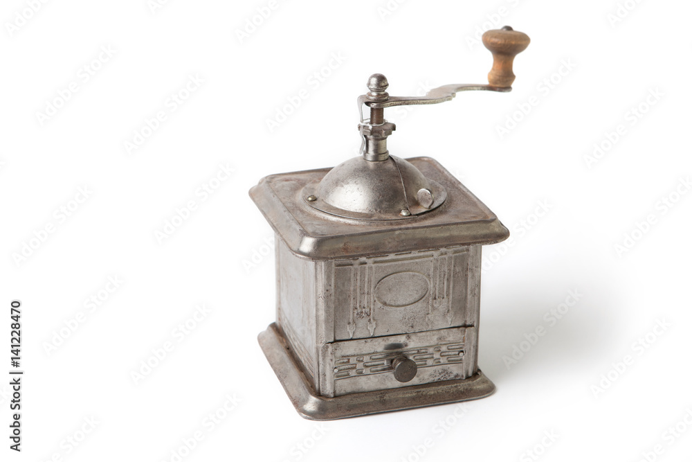 Old manual Coffee Grinder machine wooden made with coffee on the drawer Old manual Coffee Grinder machine wooden made with coffee on the drawer