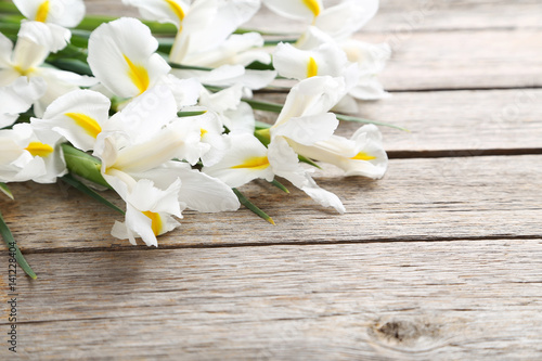 Fototapeta Naklejka Na Ścianę i Meble -  Bouquet of iris flowers on grey wooden table
