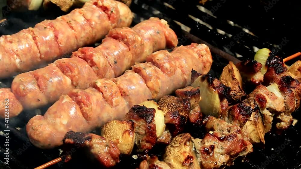 Baking fresh meat on barbecue closeup Baking fresh meat on barbecue closeup