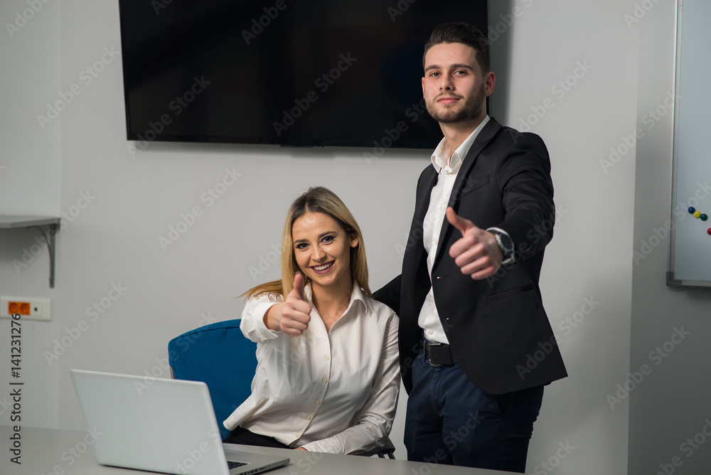 Two young IT workers together in a room Two young IT workers together in a room