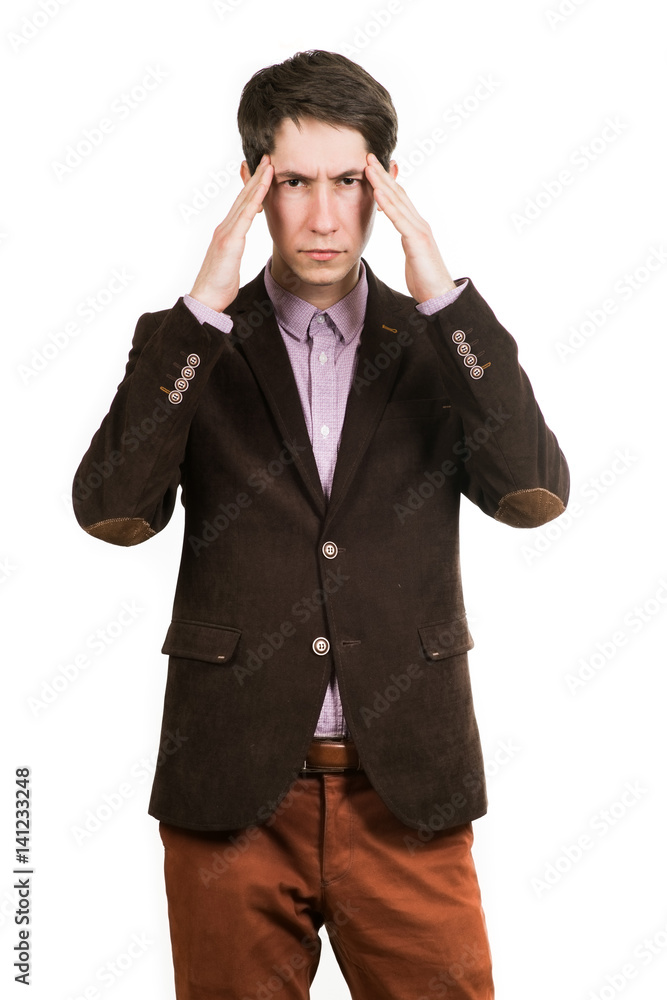 Terrible headache. young man touching his head with his hands, standing Terrible headache. young man touching his head with his hands, standing