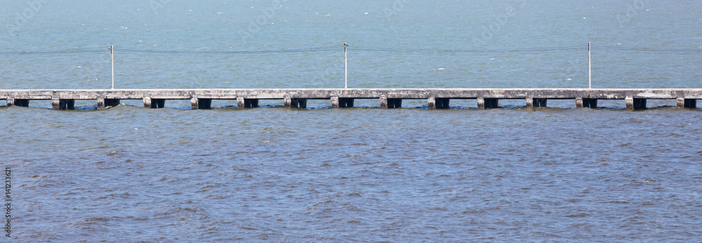 Fototapeta premium road line or bridge on water in sea