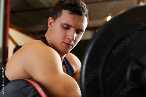 Sporty young man work out biceps © megaflopp