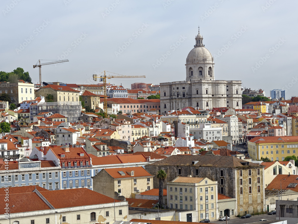 View from the River Tagus of the colorful hilly Lisbon, Portugal