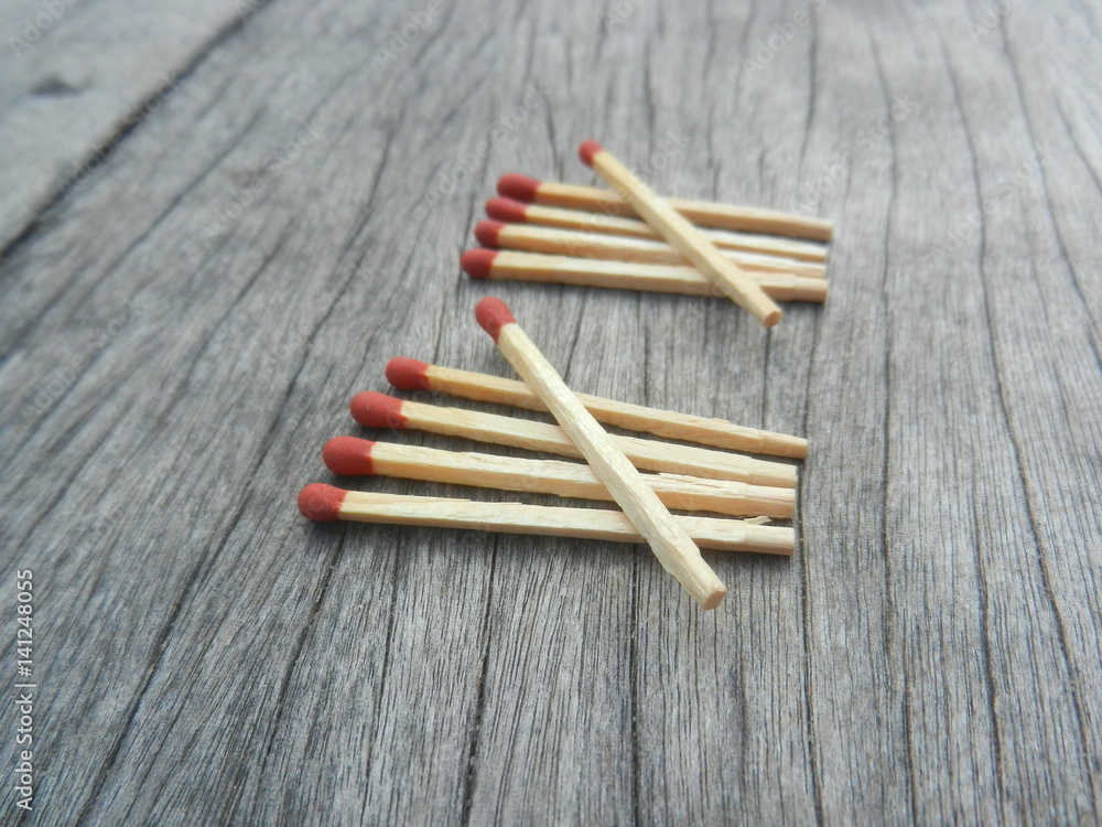 Red wooden match count number on wood background Red wooden match count number on wood background