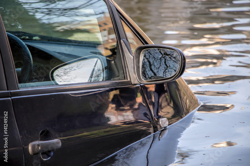 Fotografia, Obraz Car submerged in flood water.
