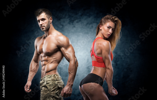 Athletic man and woman. Fitness couple. © bondarchik