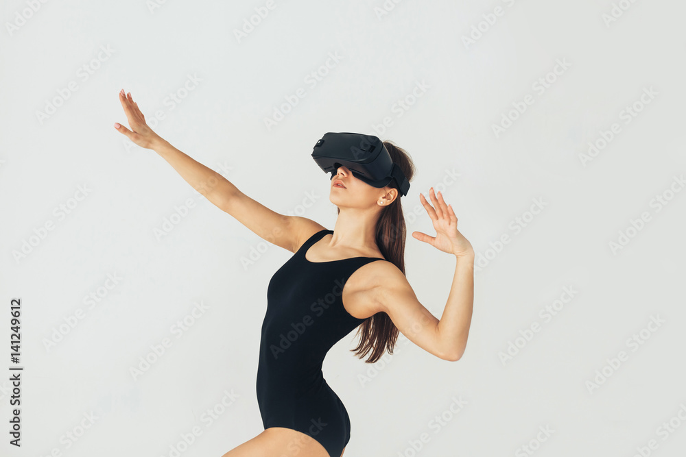 Young woman with glasses of virtual reality. Future technology concept. Modern imaging technology. Young woman with glasses of virtual reality. Future technology concept. Modern imaging technology.