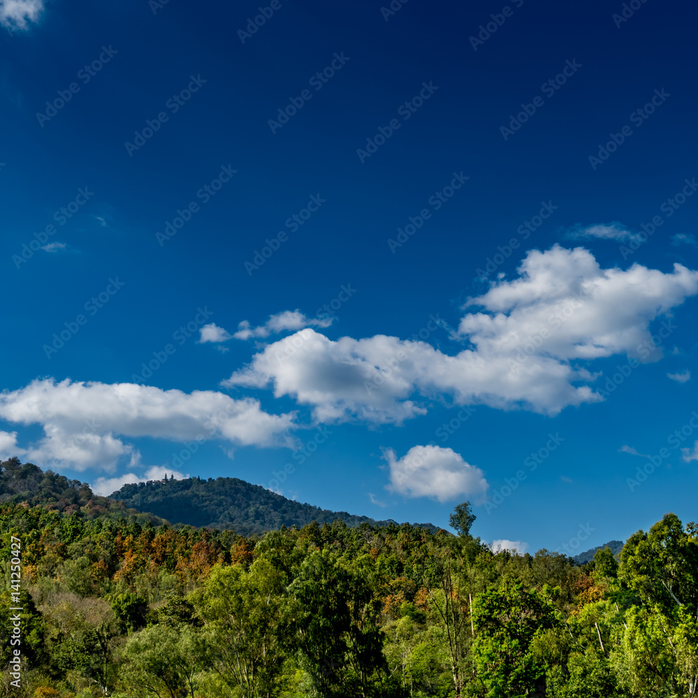 Mountain with white cloud on Blue sky