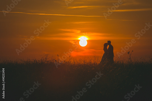 Fototapeta Naklejka Na Ścianę i Meble -  couple at sunset