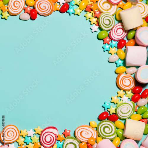 Colorful marshmallow candies and jellies as background