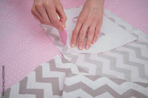 Wallpaper Mural Tailor designer working of cutting piece of cloth Torontodigital.ca