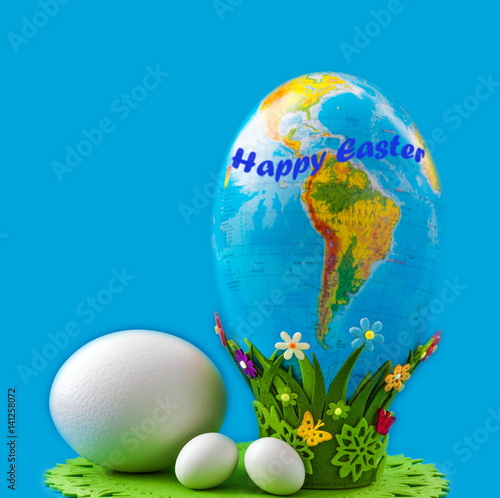 Easter  eggs and globe egg on  blue background 