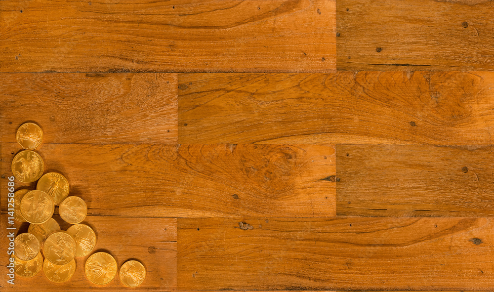 Old wooden planks with gold coins background Old wooden planks with gold coins background