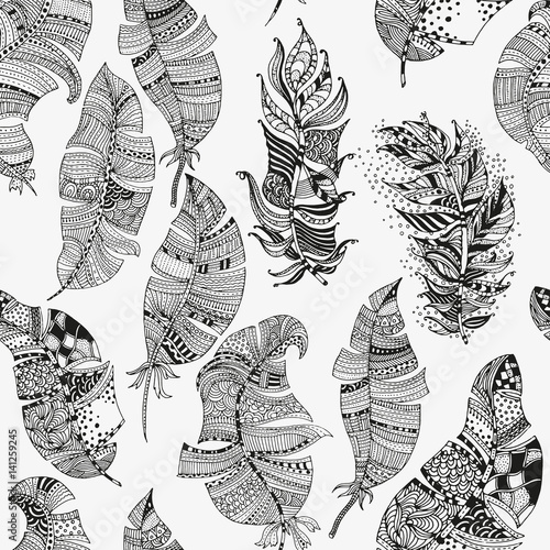 ector seamless pattern of artistically feathers