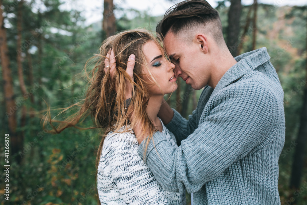 Beautiful youth couple flirting and joking in outdoor. Beautiful youth couple flirting and joking in outdoor.