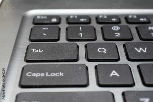 Modern laptop keyboard closeup