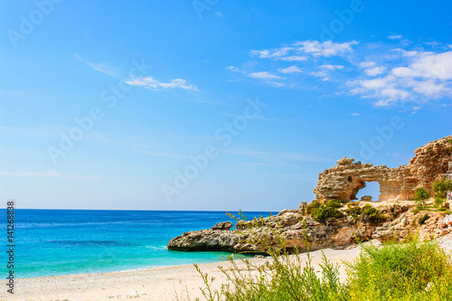 beautiful sandy beach with a cliff. ionian sea in Dhermi, Albania