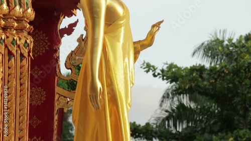 Buddhist Statue Tilt From Head To Toe
