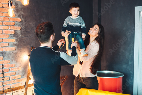 young family having fun at home