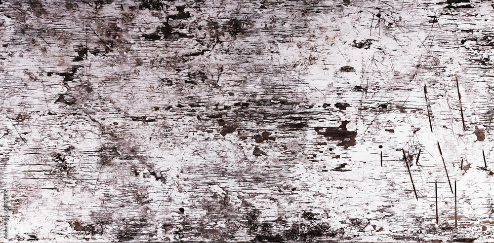 Obraz premium Wood surface with peeling paint.Dirty, weathered black and white wall.Vertical Texture.Old abstract background