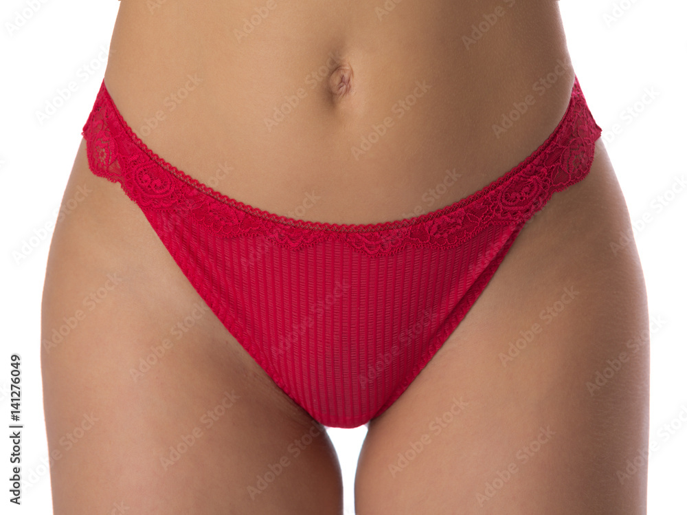 Girl in red panties close-up. Stock Photo