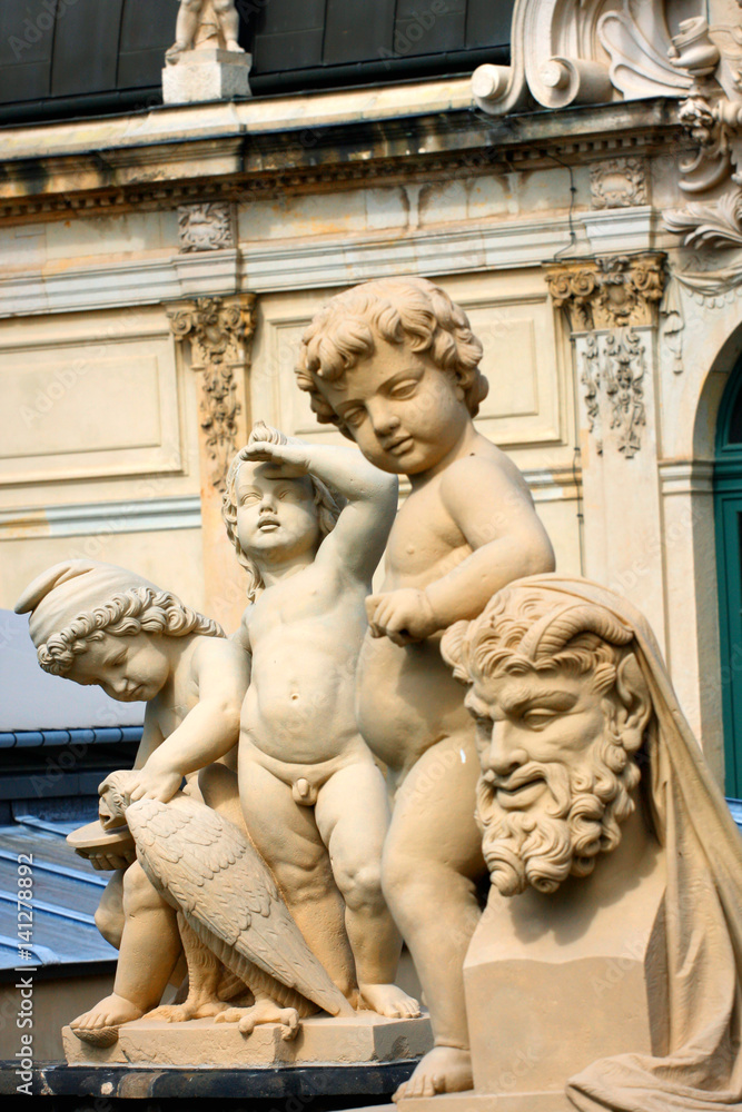 Obraz premium Richly sculptured Rampart Pavilion. Zwinger Palace (architect Matthaus Poppelmann) - royal palace 17 century in Dresden,