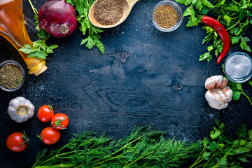 Big set organic food. Fresh raw vegetables. On a black chalkboard.