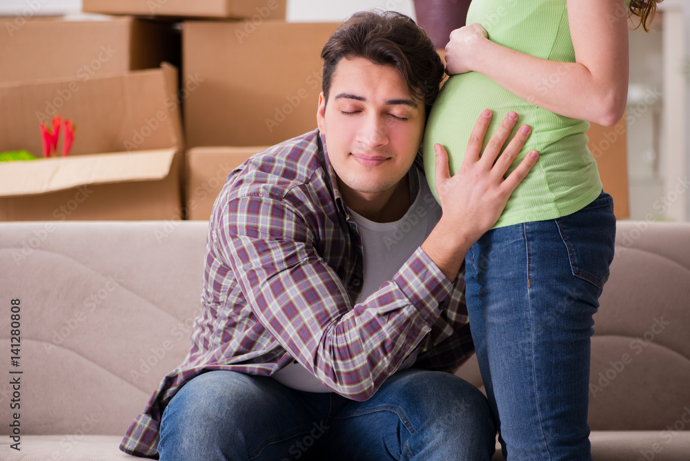 Young couple of man and pregnant wife expecting baby Young couple of man and pregnant wife expecting baby