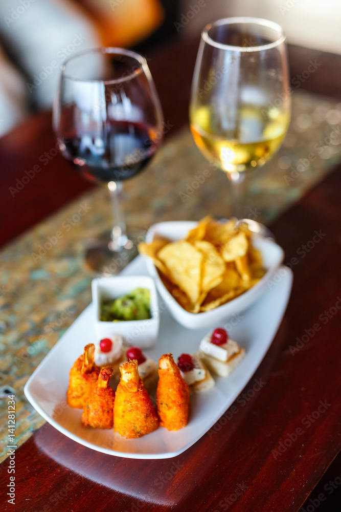 Variety of appetizers and wine