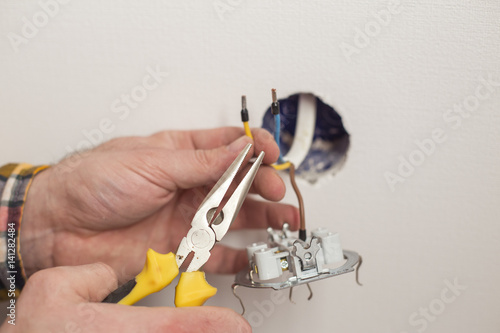 Electrician wiring a new build