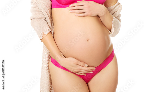 Wallpaper Mural Close up of a cute pregnant belly Torontodigital.ca