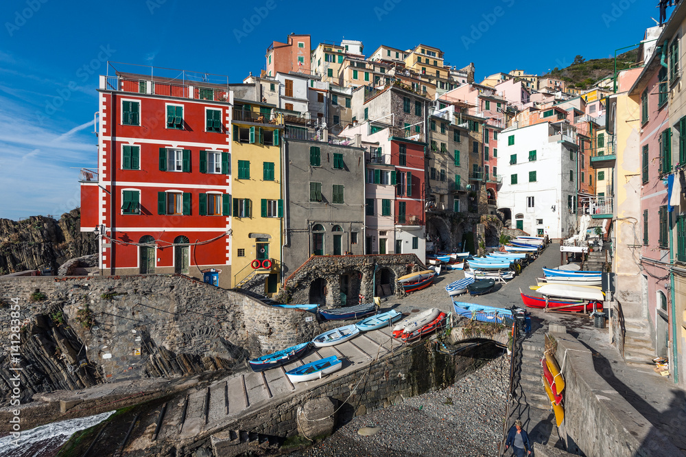 View of the architecture of Riomaggiore town. Riomaggiore is one of the most popular town in Cinque Terre National park, Italy