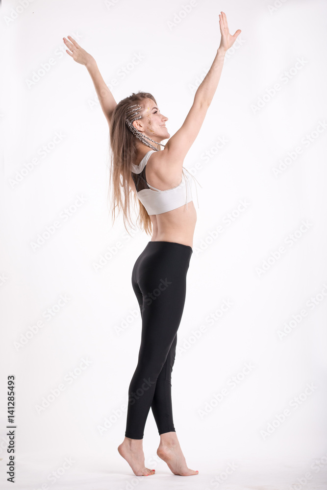 Slim sporty girl with long blond hair