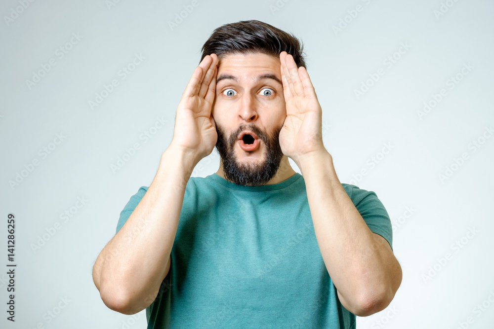 Fototapeta premium Handsome man posing with amazement